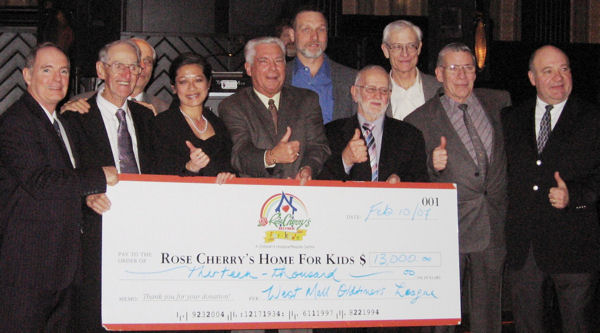 Cheque for $13,000 presented to Rose Cherry's Home for Kids from The West Mall Oldtimers